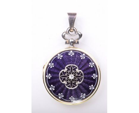 A Belle Époque diamond set and enamel locketOf circular form, the purple guilloche enamel, with white enamel decorative borde