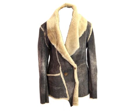 A Vivienne Westwood Red Label leather and faux fur coatThe below waist jacket light brown soft leather jacket with faux fur l