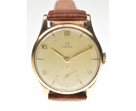 Omega: A 9ct gold manual wind wrist watchThe cream dial with applied gold baton markers and Arabic numbers, inner printed fiv