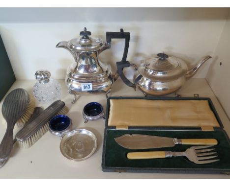 A collection of silver dressing table pieces to include a glass hobnail cut silver top scent bottle, two silver backed brushe