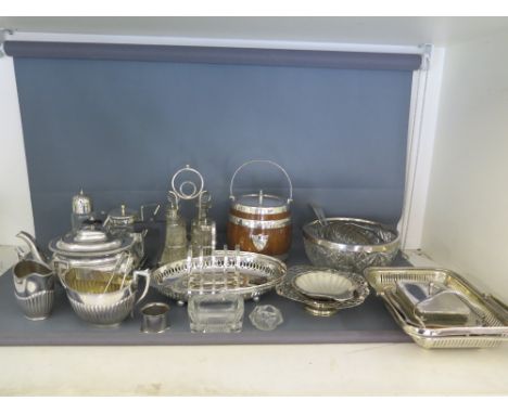 A quantity of silver plated items including biscuit barrel, cut glass salad bowl, teapot, milk and sugar etc.