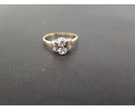 A diamond dress ring - The four old-cut diamonds to the plain band - Estimated total diamond weight 0.50ct - Stamped 18ct & P