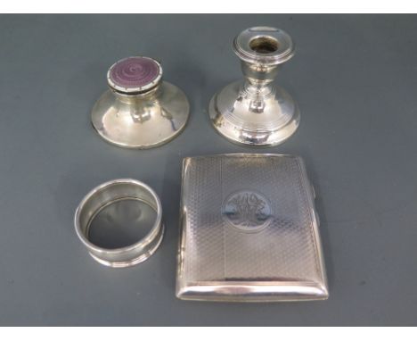 Four hallmarked silver items including cigarette case, candlestick, napkin ring and small inkwell with enamelled lid - Weigha