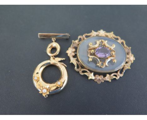 A gold and pearl three part hanging brooch, the clasp stamped and tested as 9 ct gold, the twin circular pendants one set wit