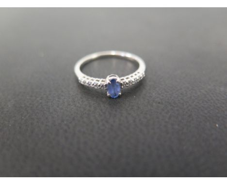 A tanzanite and diamond dress ring - Stamped 375 - Ring size L - Weight approx 1.3gms
Condition Report: Good - With light scr