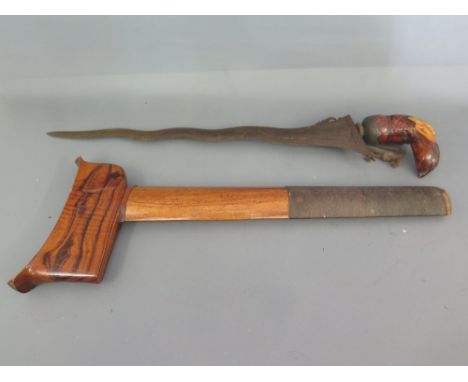 A Malayen Kris with wooden handle and scabbard blade length 36 cm 
Condition report: Overall good condition, tip missing to s