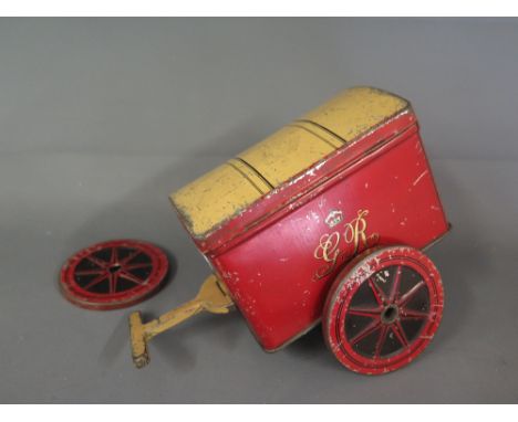 A rare Cooperative Wholesale Society Ltd. Biscuit Tin  in the form of a two wheel G R mail cart 
Condition report: One wheel 