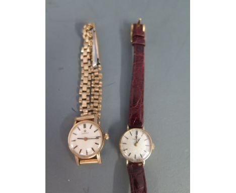 Two Omega gold watches - a 9ct gold Omega Ladies manual wind wristwatch with plated strap - Width 2 cm including winder - wor