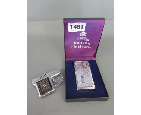 A Corona - pistol cigarette lighter and a boxed Ronson Electronic lighter 