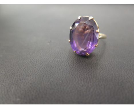 An amethyst single-stone ring - Stamped 18ct - Ring size R - Weight approx 8.7gms
Condition Report: Good to fair - With light