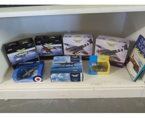 Seven Corgi Diecast models of De Havilland Mosquito Aeroplane and a book Condition report: All boxed mint condition 