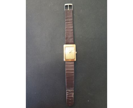 A gold plated Omega manual wind Geneve 17 jewel wristwatch on a leather strap - 24 mm x 32 mm 
Condition report: Working, som