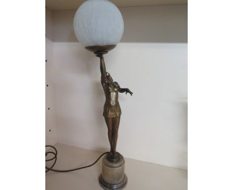 An Art Deco period spelter lady lamp with later globe shade - Height 65 cm 
Condition report: In working order 