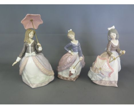 Lladro figure 'D' Abriendo Sombrilla No. 5210 with box, figure 5211 - Sombrilla en Alto with box and one other lady with para