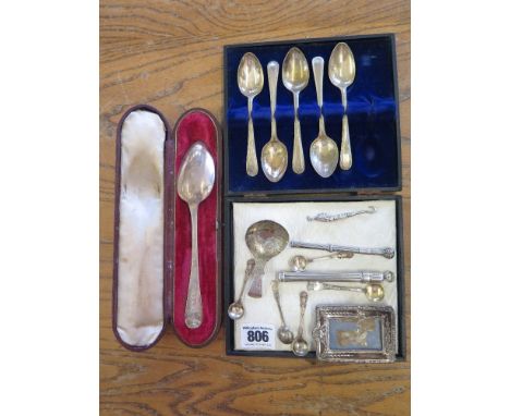 A collection of assorted silver including spoons, two pencils, a small button hook and small frame - weighable silver approx 