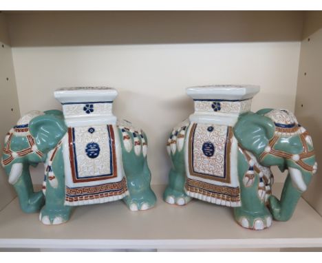 A pair of large ceramic modern Elephant stands - Height 44 cm x Length 50 cm 
Condition report: No obvious damage