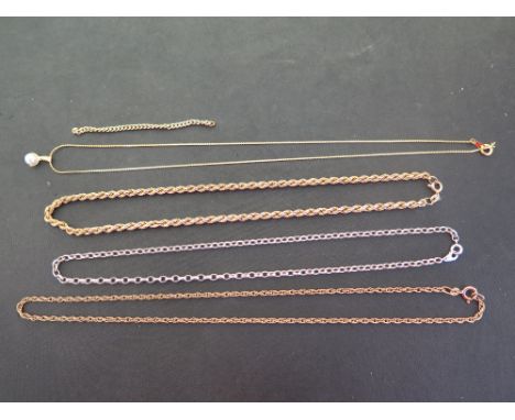 A selection of chains - To include a 9ct gold fancy-link chain - Length 46cms - A 9ct gold rope-twist chain - Length 40cms - 