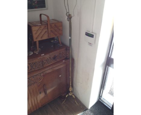 A BRASS STANDARD LAMP