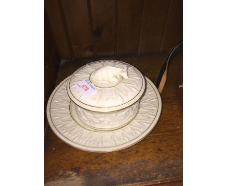 WORCESTER PORCELAIN BUTTER DISH SURMOUNTED BY A COW ON A STAND