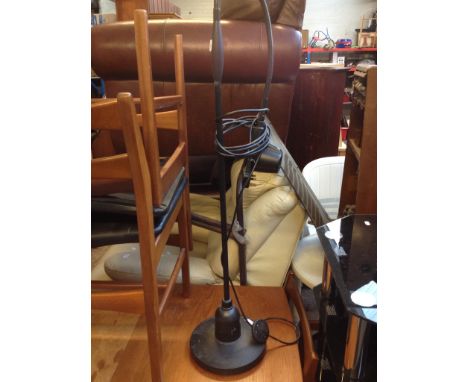A BLACK ADJUSTABLE STANDARD LAMP