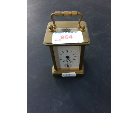 MATTHEW NORMAN, LONDON, SMALL BRASS CARRIAGE CLOCK CCONDITION:  IS TICKING, BUT NOT SOLD WITH ANY GUARENTEES, HAS NO KEY.