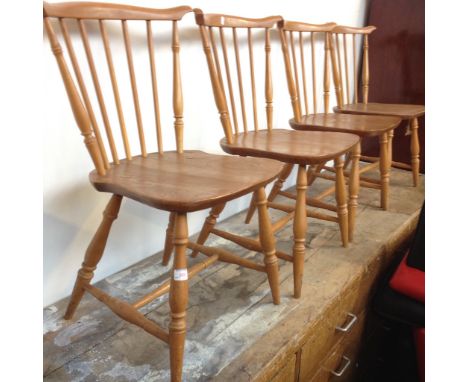 A SET OF 4 ERCOL CHAIRS