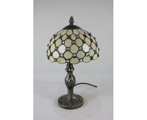 An Art Nouveau style table lamp with faceted glass shade, 38cm high