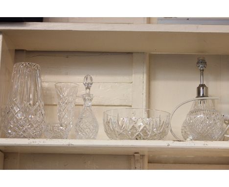 Six pieces of Waterford crystal, two vases, two bowls, a scent bottle and a cut glass table lamp base, together with a Cavan 