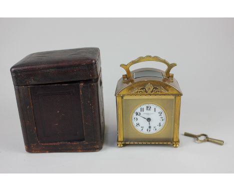 A gilt brass and bevelled glass cased domed carriage clock, the circular dial with gilt surround marked Collingwood &amp; Son