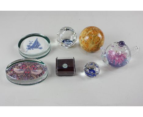 A Caithness miniature millefiori glass paperweight, boxed, together with six assorted paperweights to include an Italian carv