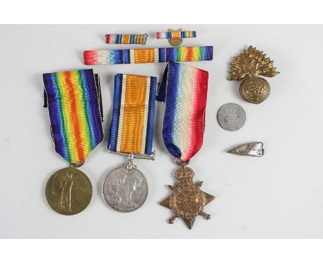 A group of First World War medals comprising Victory medal, British War medal, and 1914-15 Star, to GS-8913 Pte W G Alexander