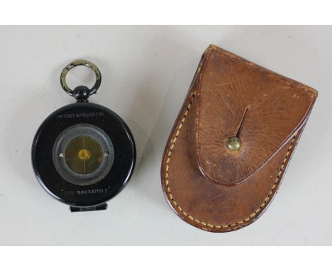 A black lacquered compass, 'The Magnapole', in fitted leather case