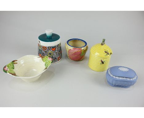 A Bizarre by Clarice Cliff Fantasque preserve pot decorated with a melon and other fruit, 6cm, (a/f - missing lid), together 