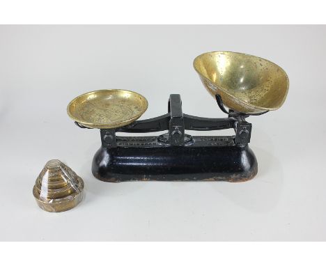 A set of W &amp; T Avery Ltd scales with brass pans and a set of seven weights