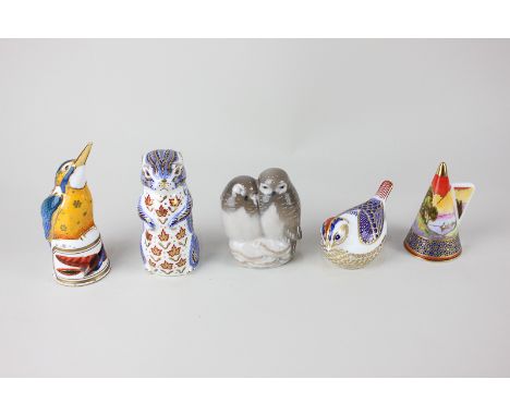 A Royal Copenhagen porcelain model of two owls, two Royal Crown Derby paperweights, an otter, a wren, both with silver stoppe