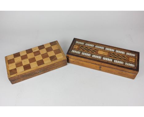 Two early 20th century wooden travelling game sets, draughts and backgammon, and dominoes and cribbage