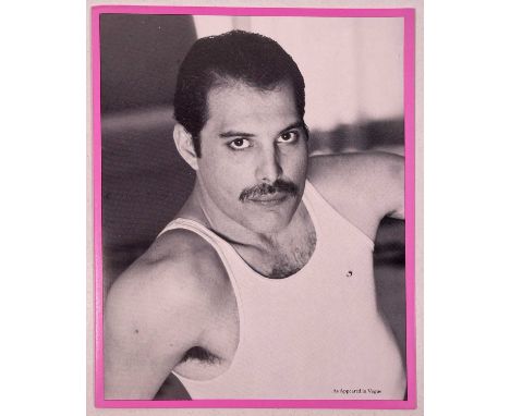 A dayglo Christmas card featuring portrait of Freddie Mercury and printed text 'Merry Christmas From the Preening, Pouting, P