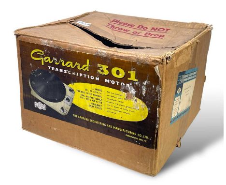 A Garrard Model 301 transcription turntable, with original manual and cardboard packaging. Grease bearing, excellent conditio