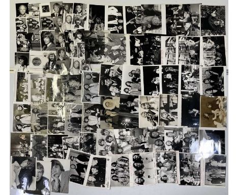 Approx 187 variously sized (many c 8x10") black and white press photographs depicting Bee Gees, many vintage prints with pres