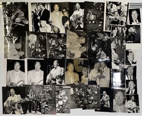 Approx 35 variously sized (many c 8x10") black and white press photographs depicting Bill Haley, many vintage prints with pre
