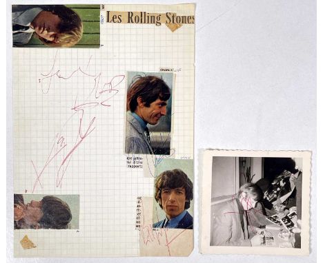 A notebook page (15x21cm) bearing signatures from Keith Richards and what appears to be a rushed Charlie Watts signature, als