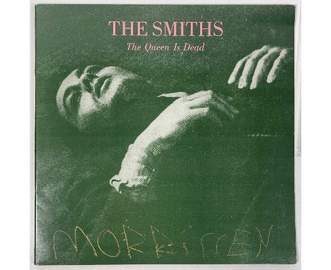 A copy of The Smiths - The Queen is Dead (ROUGH 96, original UK MPO pressing, disc in glossy VG condition with some light hai