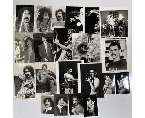 Approx 17 variously sized (many c 8x10") black and white press photographs depicting Frank Zappa, many vintage prints with pr