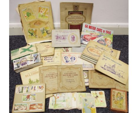 Cigarette cards including Gallaher army badges, Wills garden flowers, seashore, railway equipment, etc; Kensitas cards; Snap,