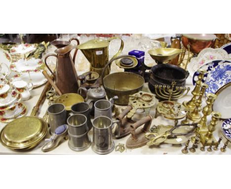 Metalware including weighing scales; a metal cauldron 21cm diameter; copper haystack ewers; brass candlesticks; trivets; jam 