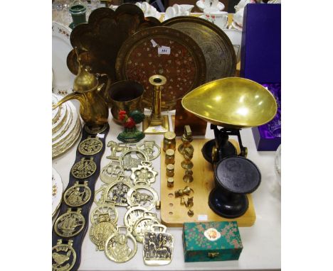 An Indian brass, scalloped edged tray decorated with Lord Shiva, Ganesh and a sacred cow; other trays; a Moroccan brass teapo