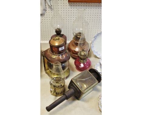 A copper and brass 'ships' lantern; a coaching lantern; an oil lamp with copper reservoir; others (6)