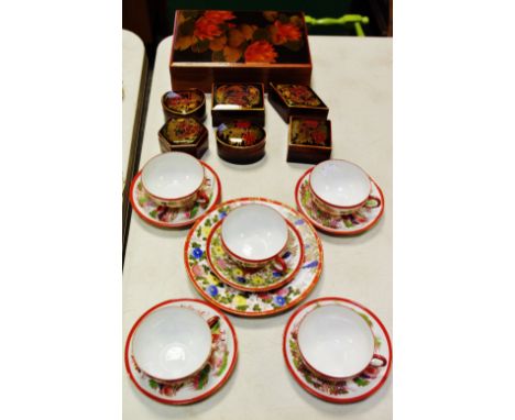 Oriental lacquered boxes, eggshell teacups and saucers