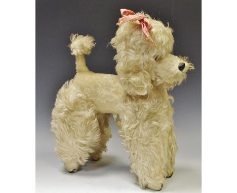 Juvenalia - Toys - an early 20th century wind-up Chiltern musical poodle with moving head 