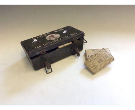 A U.S army first aid kit with original tourniquets, dressings etc